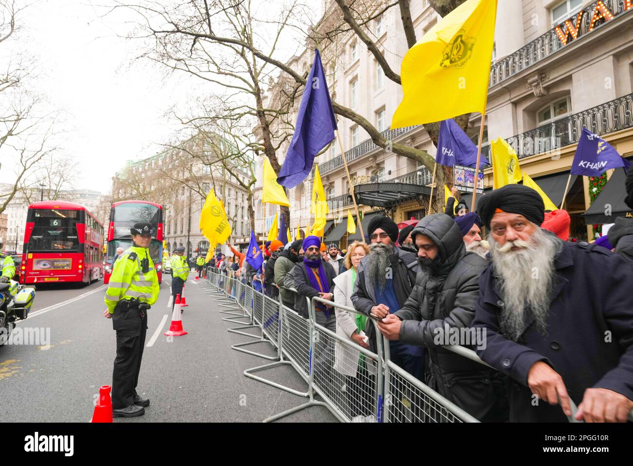 London, UK. 22nd Mar 2023. Police officer watching over a peaceful crowd at Indian High Commission in London. Credit: Known Studio/Alamy Live News Stock Photo