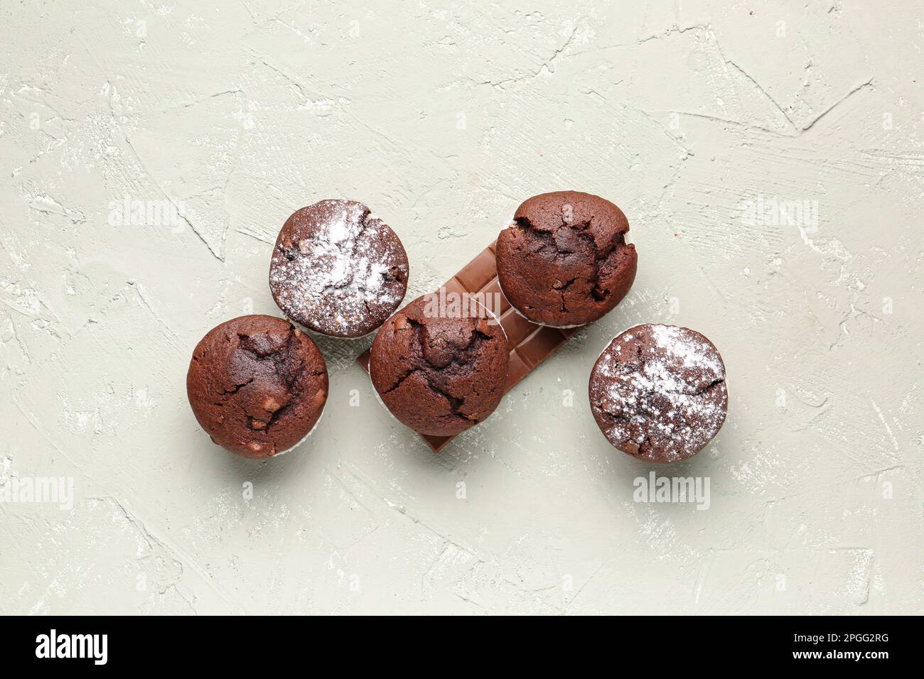 Tasty chocolate cupcakes on light background Stock Photo