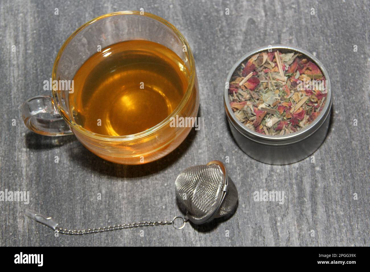 Glass cup for herbal tea preparation, infuser, spoon, dehydrated plants ...