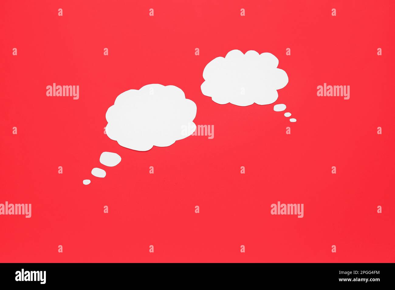 Blank speech bubbles on red background Stock Photo