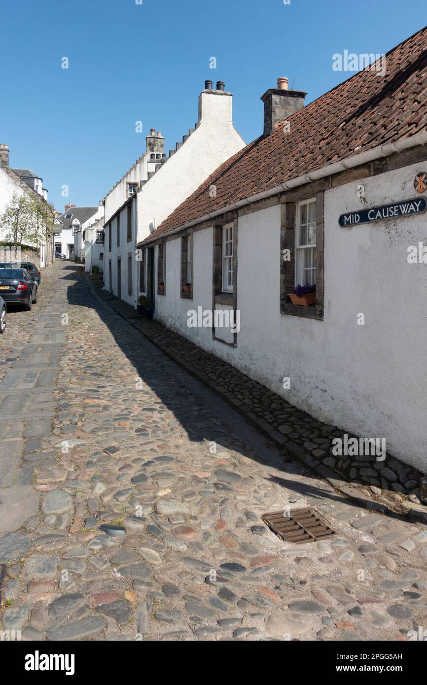 Mid Causeway, a resential street with houses from different centuries, in the historic Royal Burgh of Culross, Fife, Scotland. Stock Photo