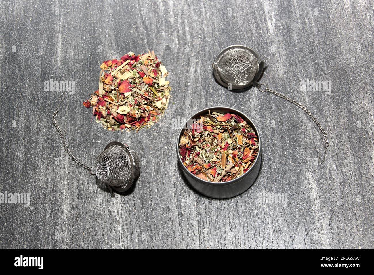 Tools for the preparation of herbal tea: glass cup, infuser, spoon ...