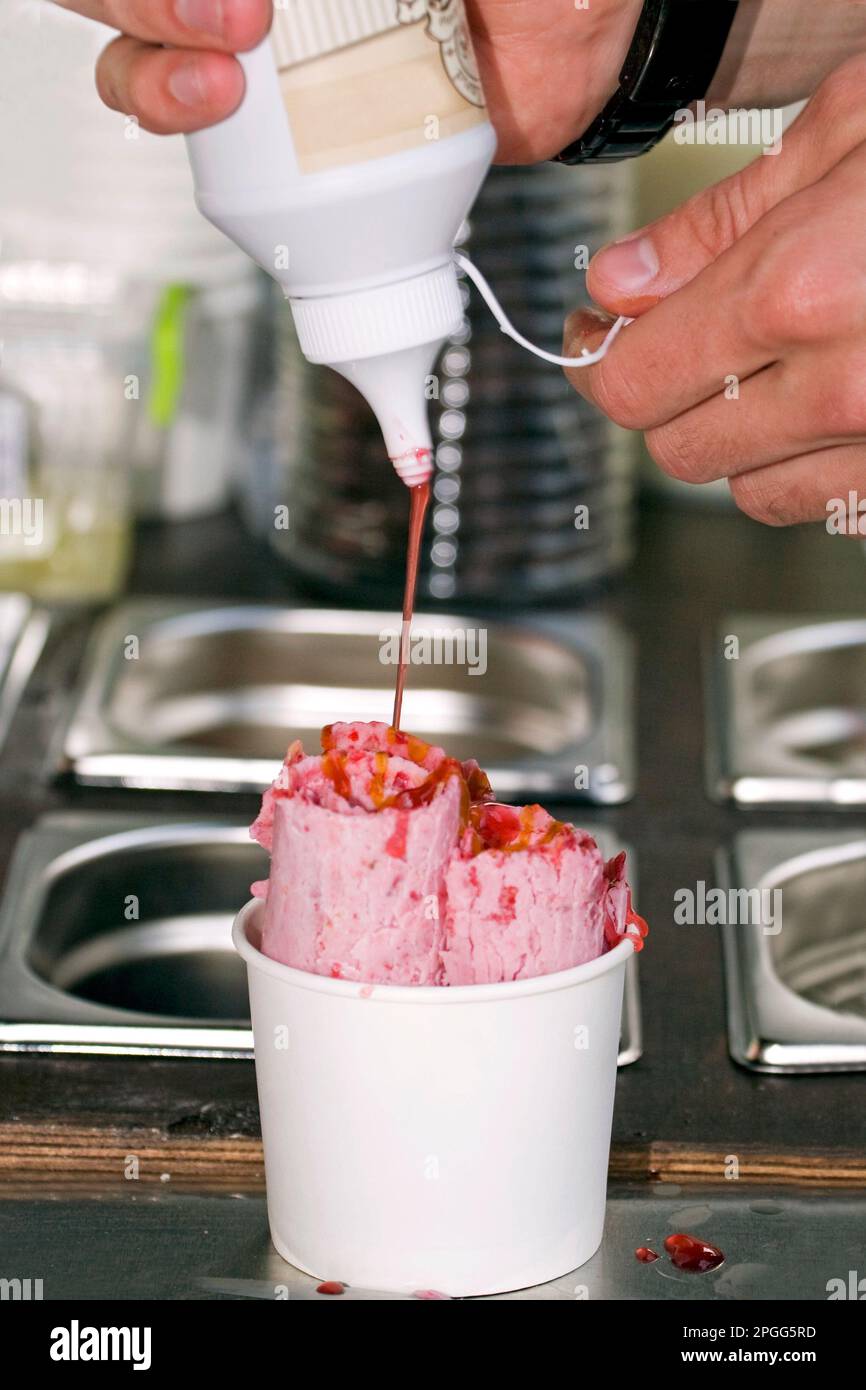 Roll ice cream with jam Stock Photo Alamy