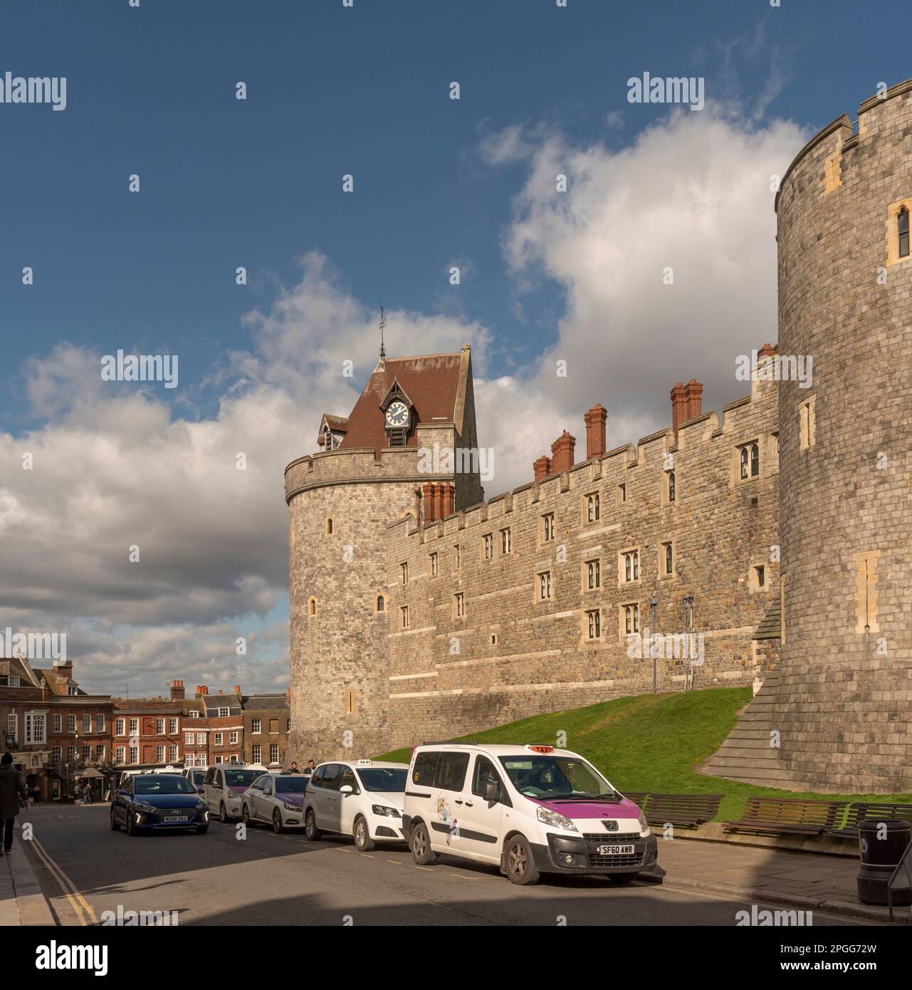 Windsor, Berkshire, England, UK. 2023. Taxi rank situated by the Curfew Tower of Windsor Castle a royal residence. Stock Photo