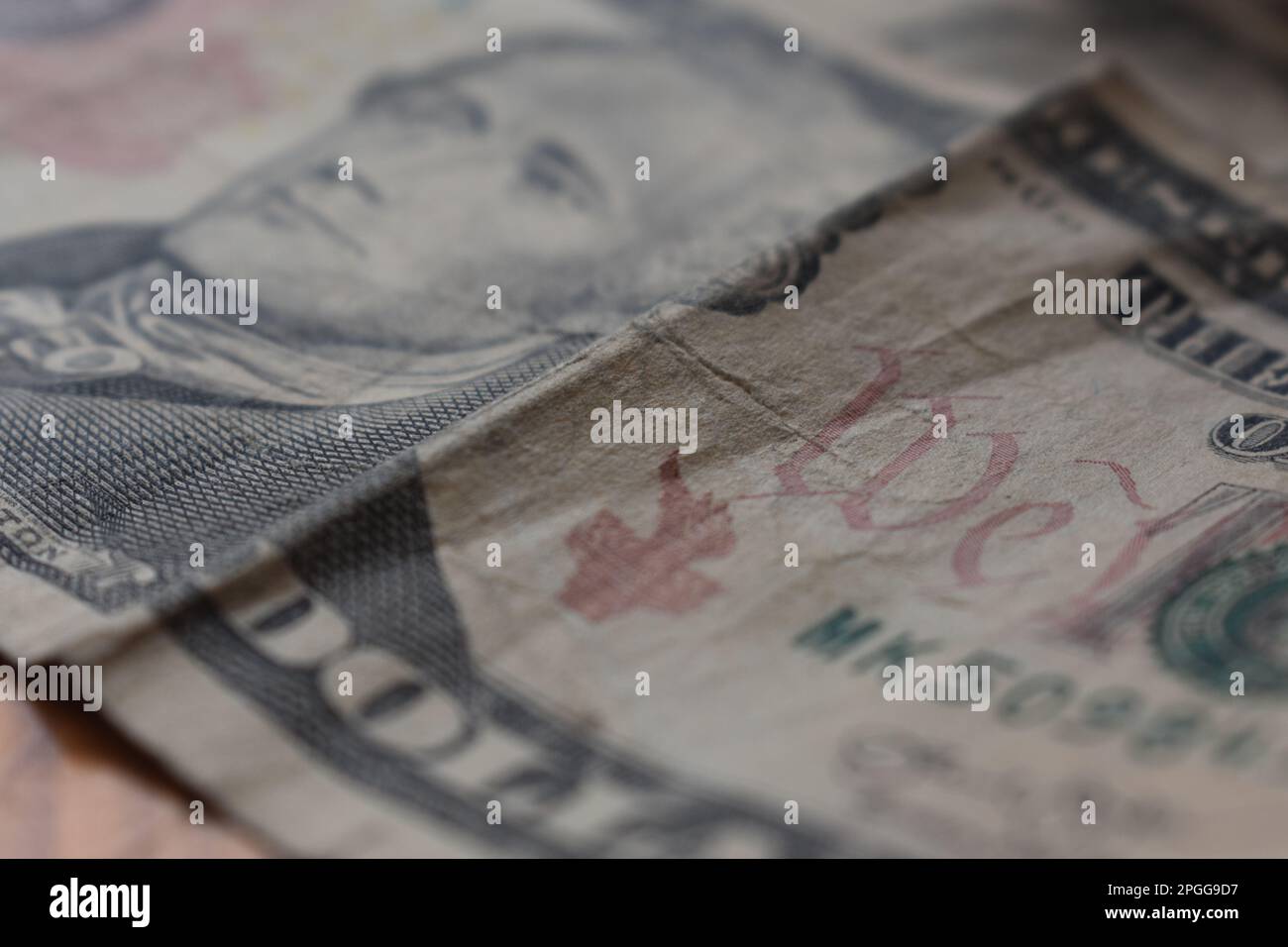 American 10 (ten) dollar bills lying on a table. Portrait of Alexander Hamilton.  United States, US, USA Stock Photo