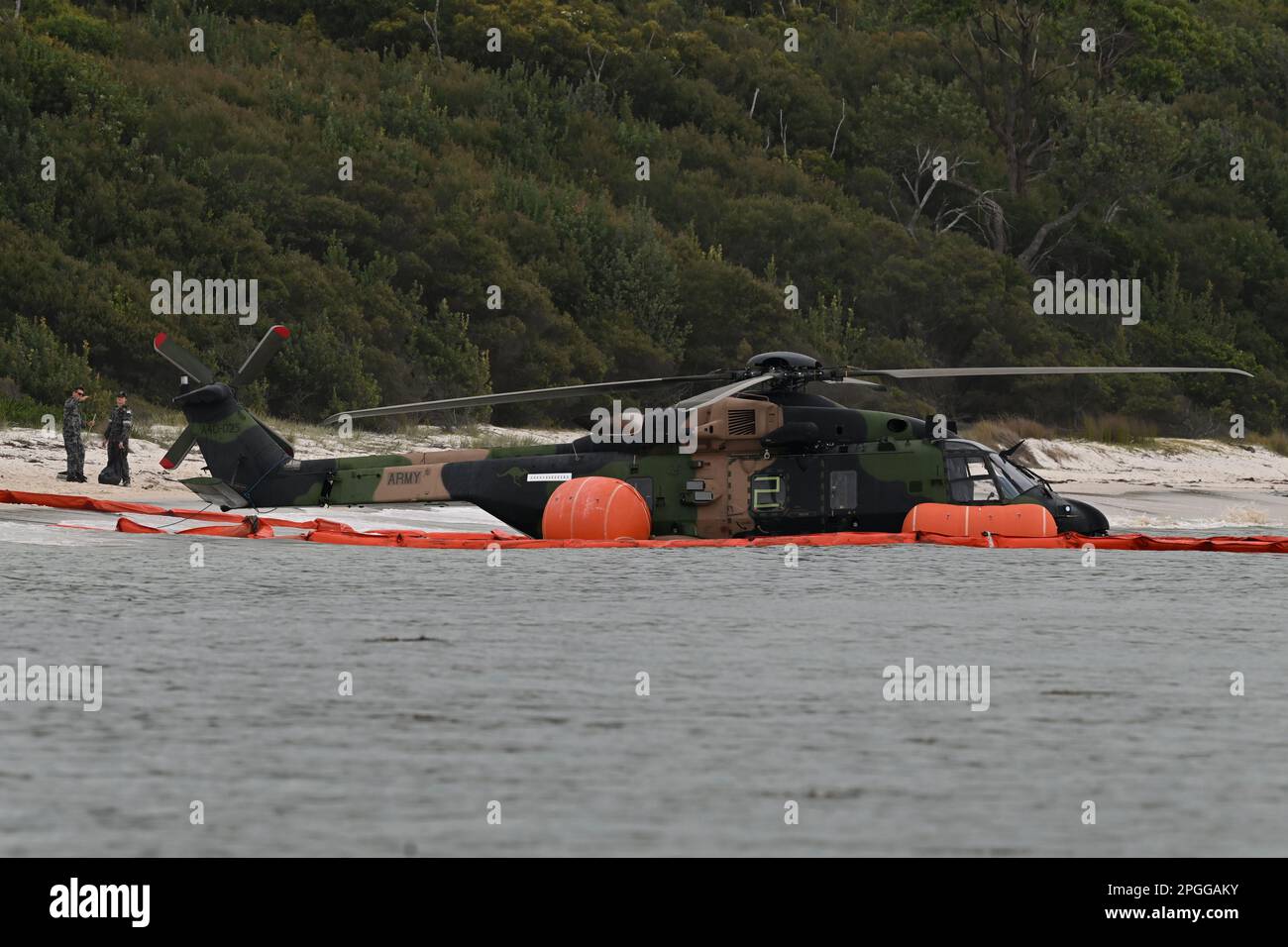 Naval personel at the scene where an Army MRH90 Taipan multirole