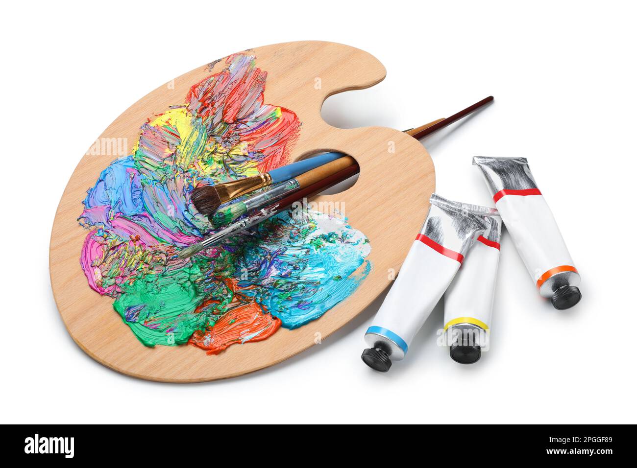 Paint palette with various acrylic paints and a brush Stock Photo - Alamy