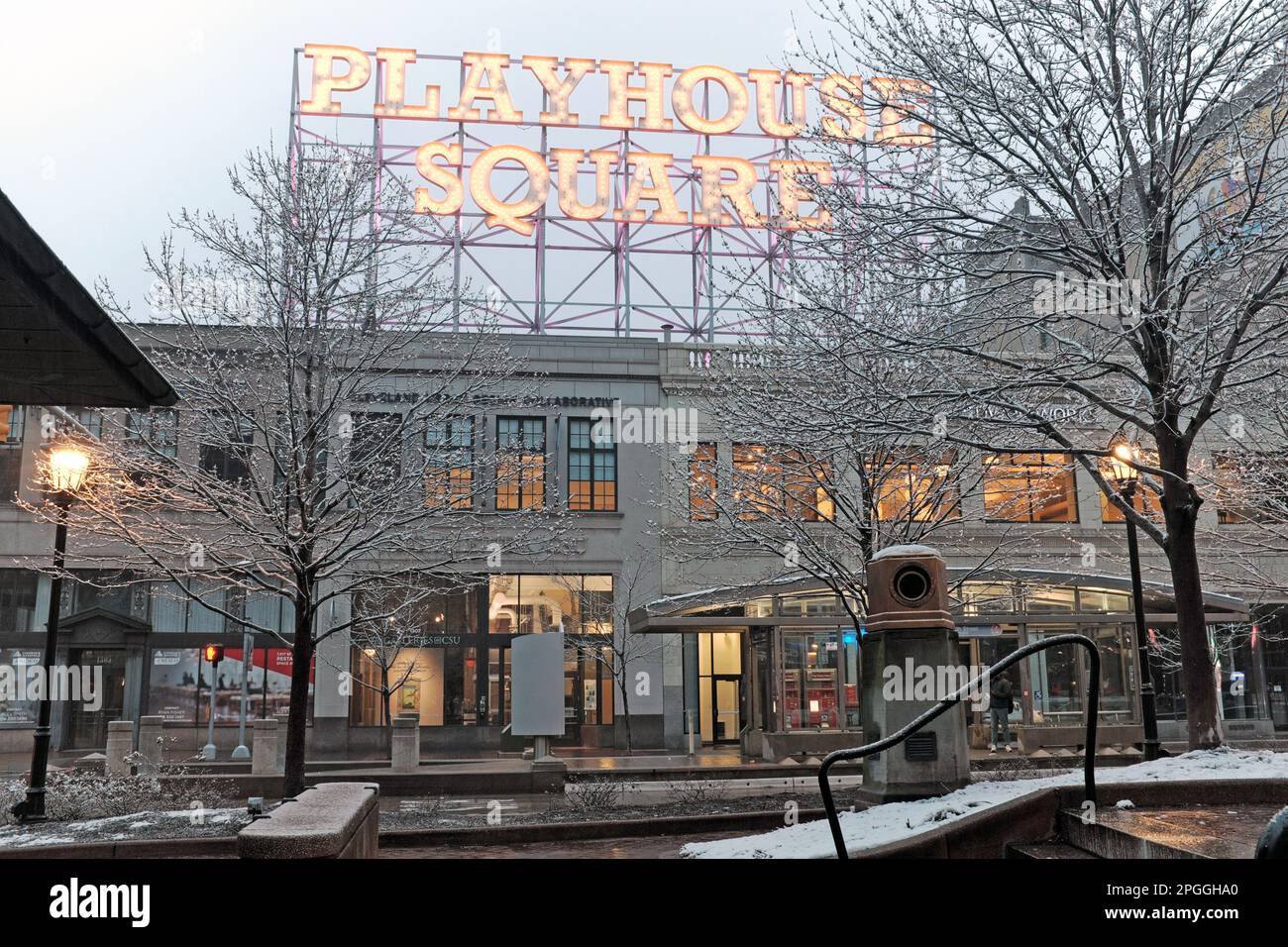 Historic 'Playhouse Square' stick sign illuminated and viewed from US Plaza in the Playhouse Square Theater District after a snowfall in Cleveland, OH Stock Photo