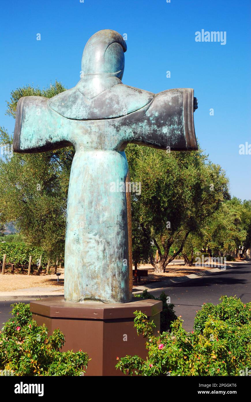 A sculpture of St Francis of Assisi with arms extended, welcomes visitors to the Robert Mondavi winery in the Napa Valley Stock Photo
