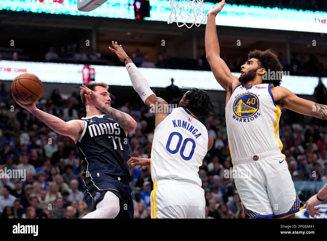 Dallas Mavericks guard Luka Doncic (77) makes a pass as Golden State ...