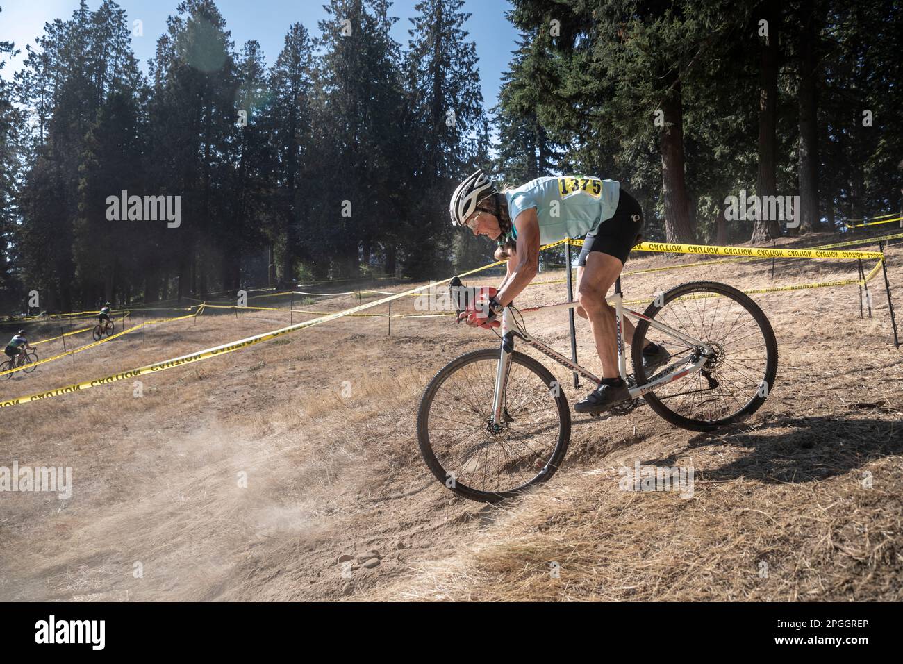 WA240445-00....Washington - Senior citizen (69 years) Vicky Spring compeating in a cyclocross race in Western Washington. Stock Photo