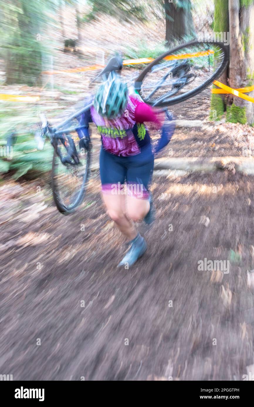 WA24106-00....Washington -Woman compeating in a cyclocross race in Western Washington. Stock Photo