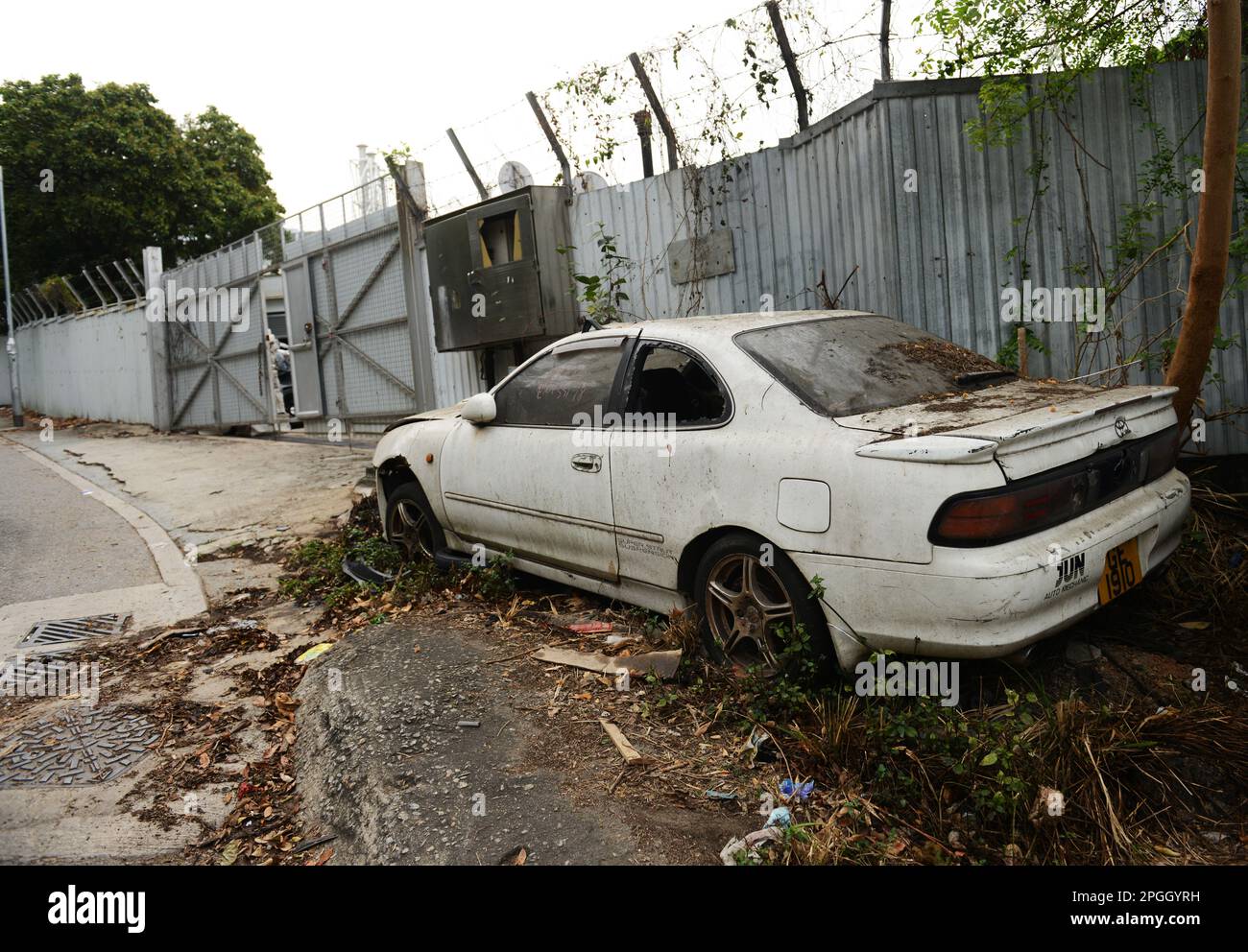 An old broken Toyota Corolla. Stock Photo