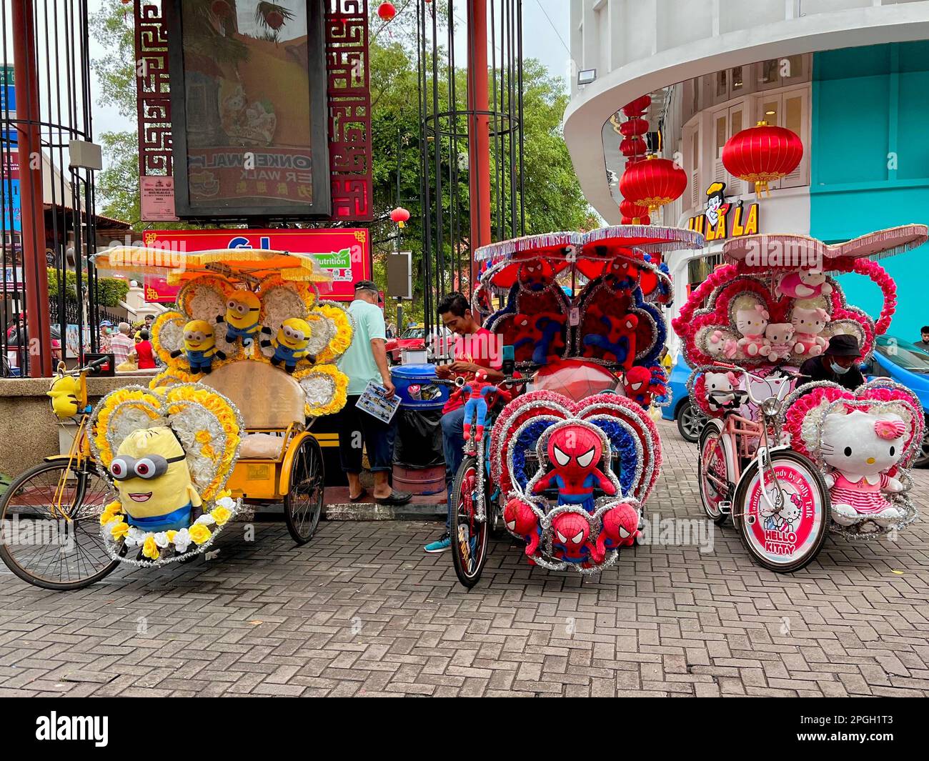 Malakka, Malaysia. 05th Mar, 2023. Rickshaw drivers wait for customers in the center of Malacca. The world heritage site on the southwest coast of Malaysia is home to what are probably the world's most insane rickshaws. Tourists can explore the city's colonial history amid a frenzy of stuffed animals and plastic roses. (to dpa 'The world's craziest rickshaws: With Hello Kitty through Malacca ') Credit: Carola Frentzen/dpa/Alamy Live News Stock Photo