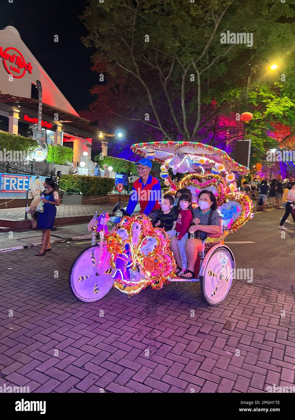 Malakka, Malaysia. 05th Mar, 2023. When night falls in Malacca, the shrill rickshaws get into