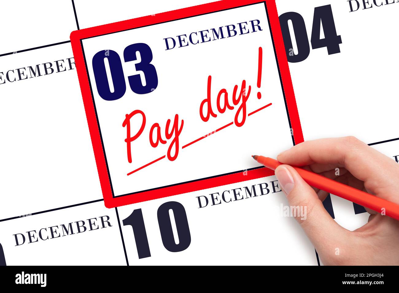 3rd day of December. Hand writing text PAY DATE on calendar date December 3 and underline it. Payment due date. Reminder concept of payment. Winter mo Stock Photo