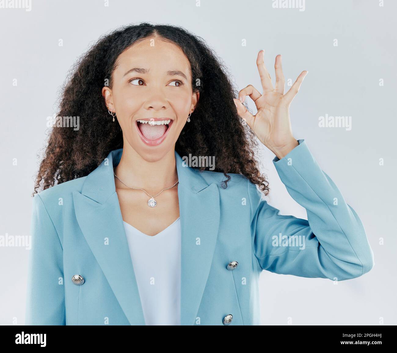 Wow Sign Hand Woman, okay sign and wow face in studio for agreement, support and ...