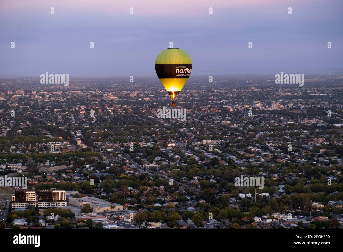 Hot air balloon over the suburbs of Melbourne, Victoria, Australia Stock Photo