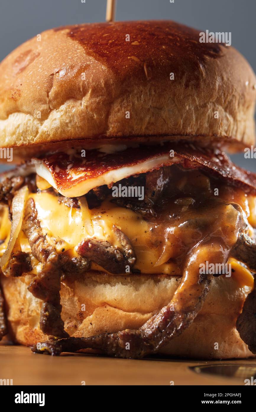 Double steak burger with smoked bacon, cheddar cheese and bbq sauce