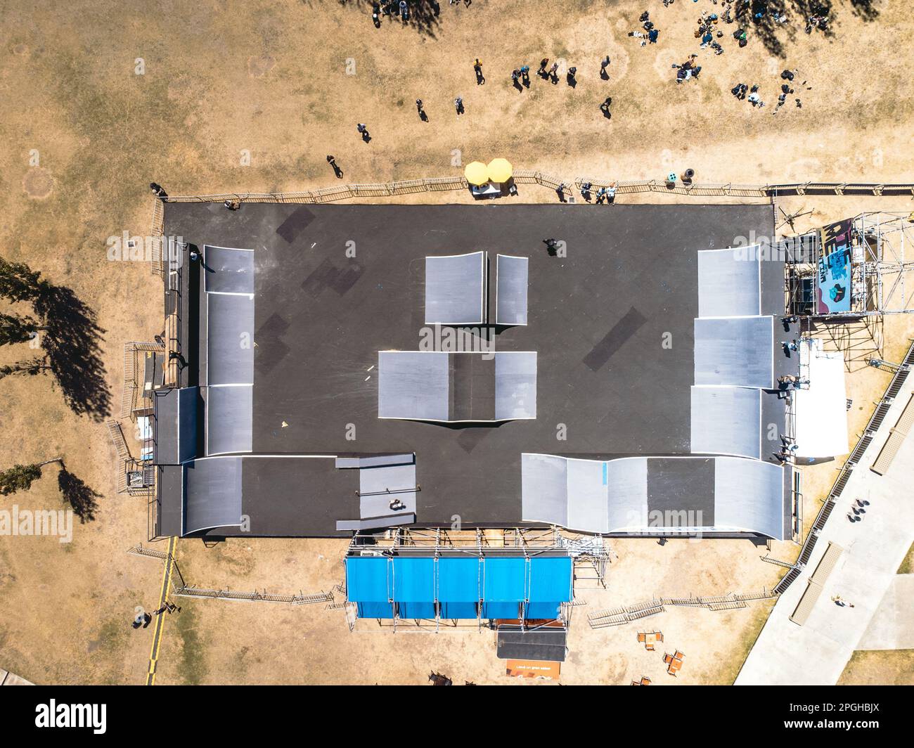 Aerial view of a skate park featuring ramps, rails, and half-pipes for ...