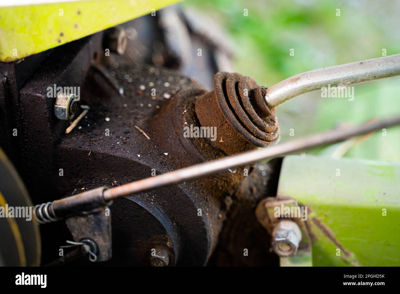 Gear lever on a walkbehind tractor closeup on a blurred background