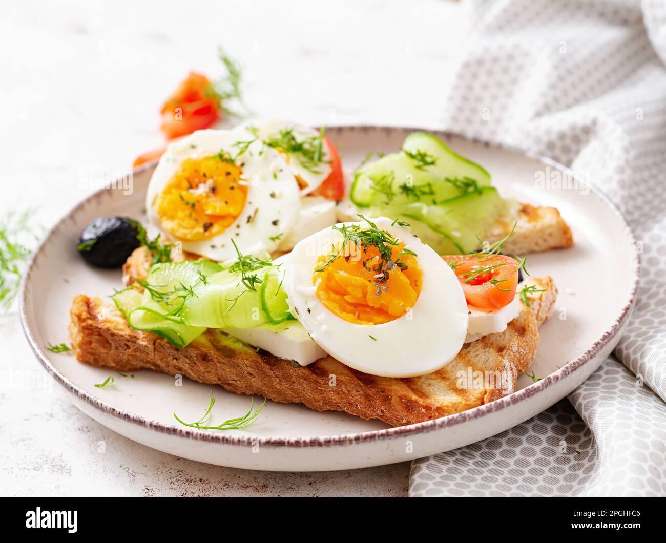 Healthy breakfast. Toast with feta cheese and egg. Healthy balanced