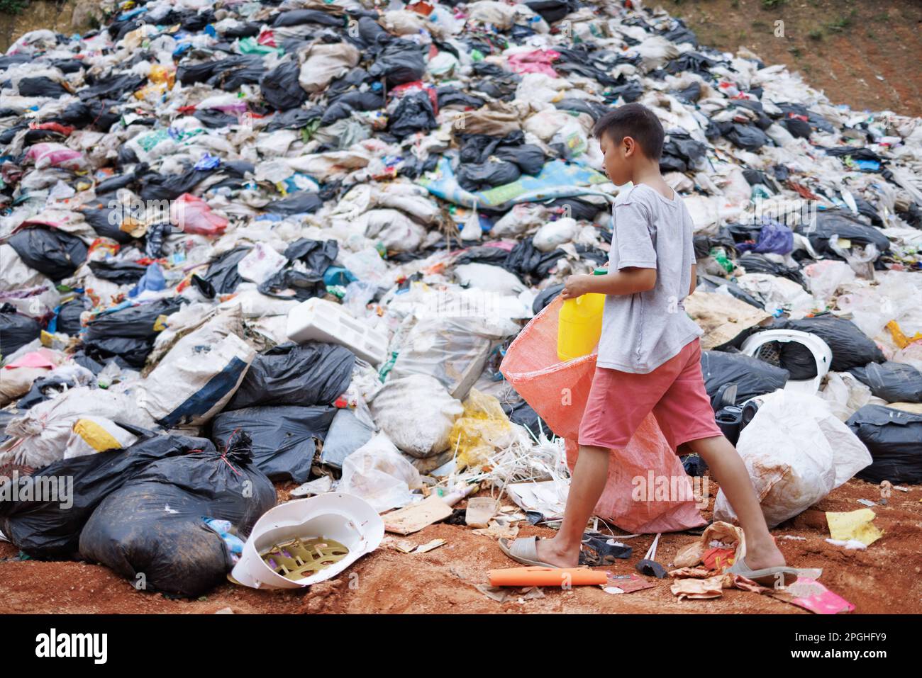 Poor children collect garbage for sale because of poverty, Junk recycle, Child labor, Poverty