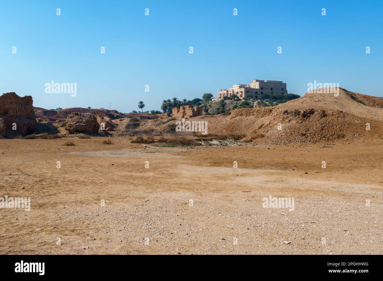 Babylon, Iraq - Feb 11, 2023: Landscape Ultra Wide of the Presidential Palace of Saddam Hussein Overlooking the Historic Babylon Ruins, which is Turne Stock Photo