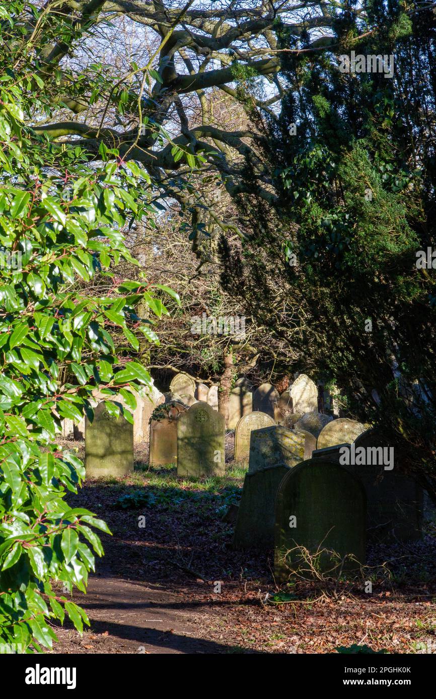 Aging Victorian gravestones in a public Suffolk cemetery Stock Photo