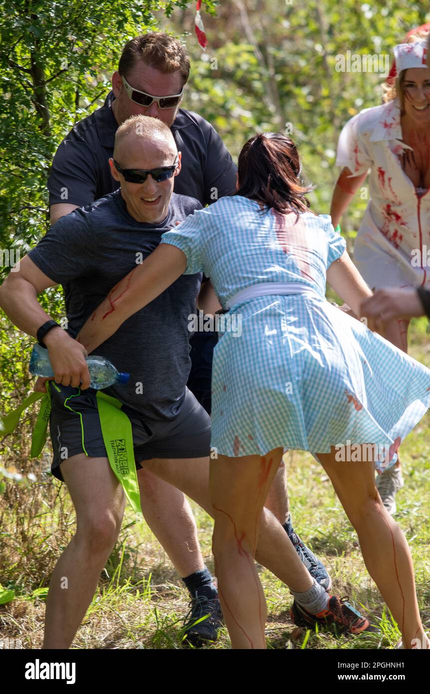 An event in Norfolk where runners complete an assault course whilst ...