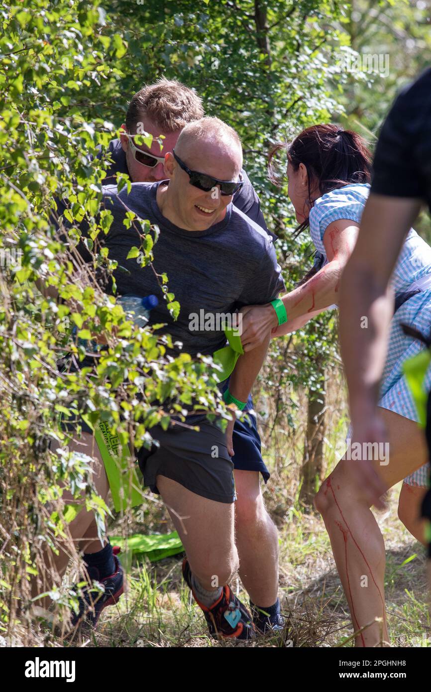 An event in Norfolk where runners complete an assault course whilst ...