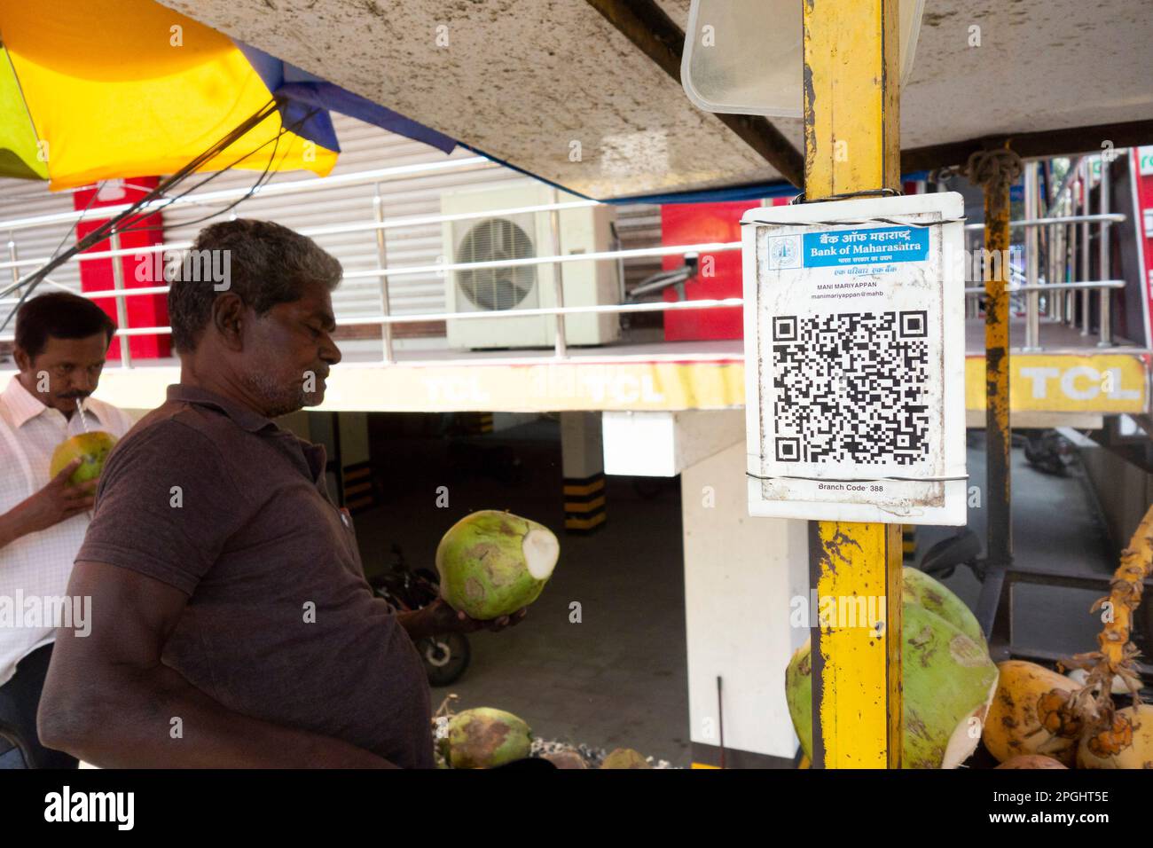 QR code for cashless payment on the stall of a coconut vendor in Trichy,Tamil Nadu, India Stock Photo