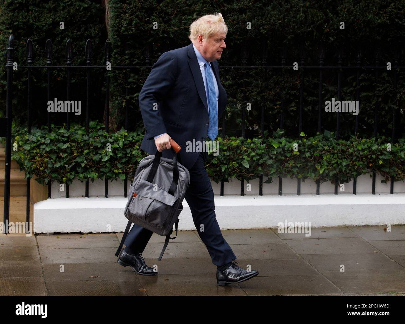 Former Prime Minister, Boris Johnson, leaves home to attend a committee hearing at Portcullis House to be questioned about parties at Number 10. Stock Photo