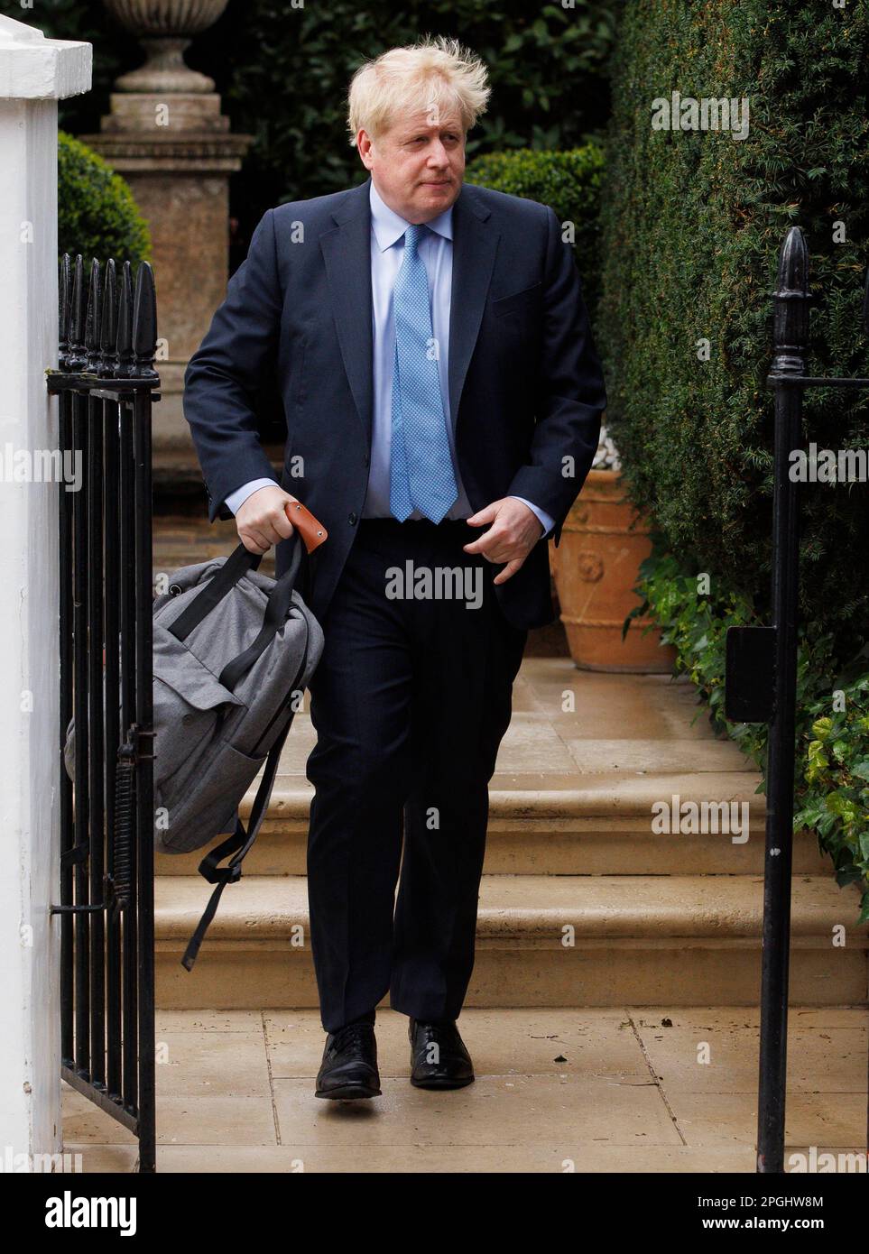 Former Prime Minister, Boris Johnson, leaves home to attend a committee hearing at Portcullis House to be questioned about parties at Number 10. Stock Photo