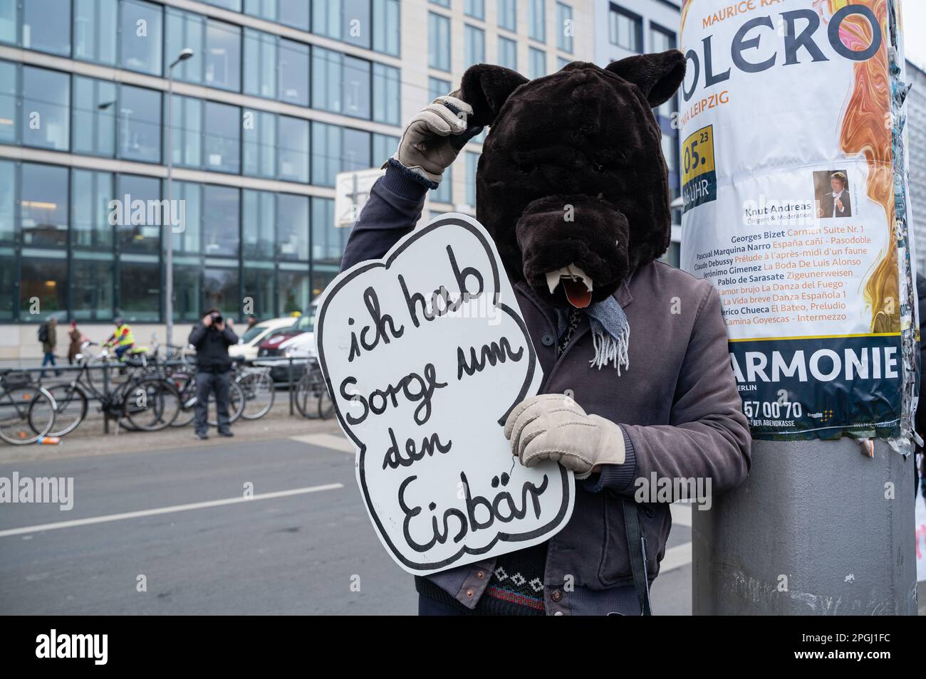 03.03.2023, Berlin, Germany, Europe - A climate activist wearing a bear disguise expresses his concern about the endangered polar bears at a rally. Stock Photo