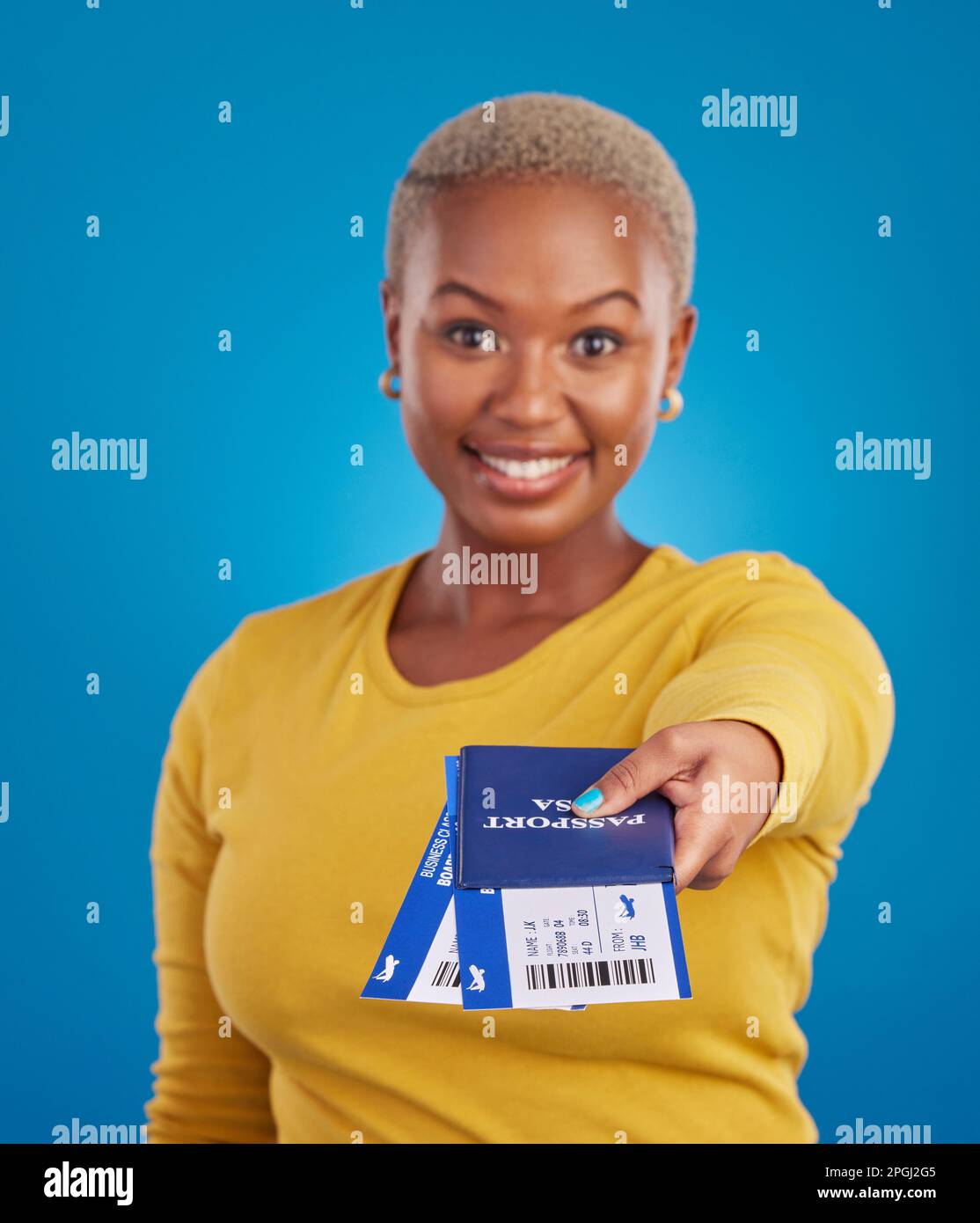 Giving passport, travel tickets and portrait of black woman in studio