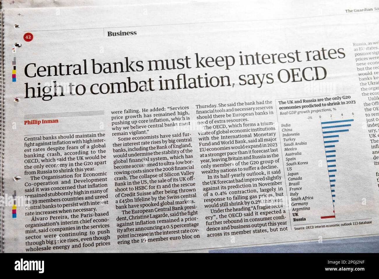 'Central banks must keep interest rates high to combat inflation says OECD' Guardian newspaper headline financial article 18th March 2023 London UK Stock Photo