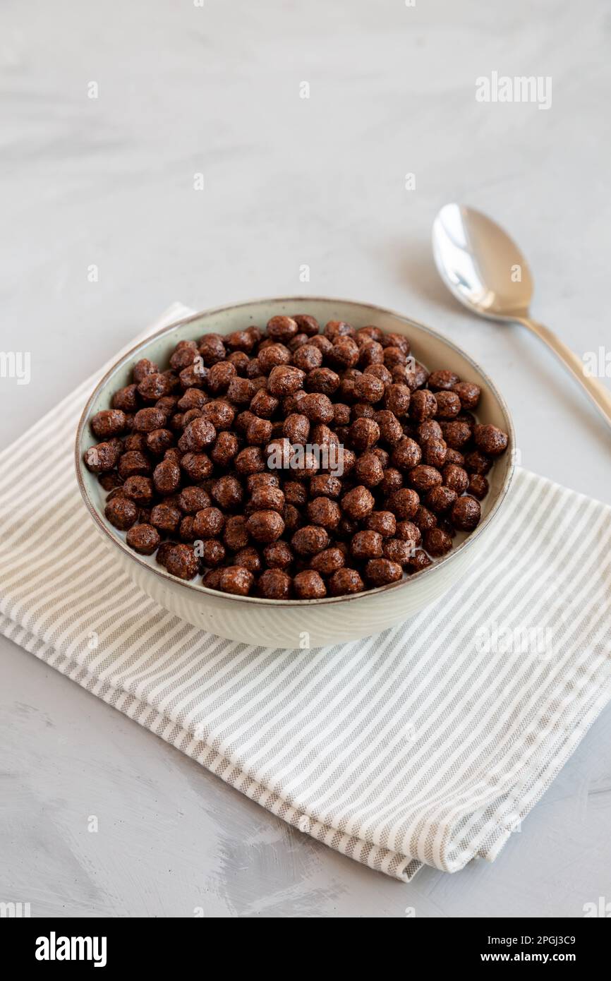 Chocolate Puff Cereal with Milk in a Bowl, side view Stock Photo Alamy