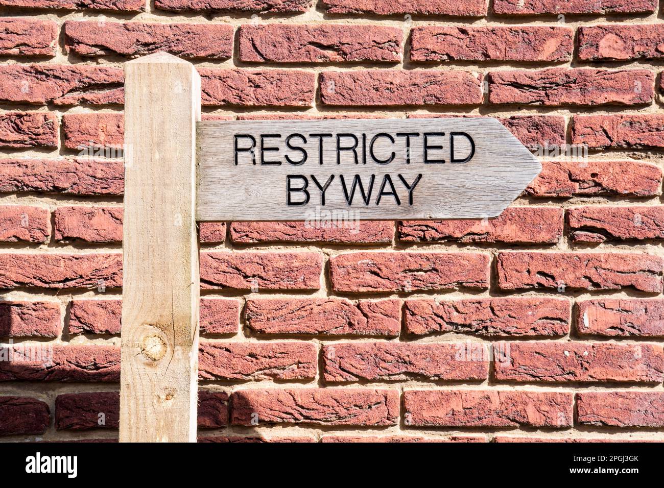 Sign for a Restricted Byway - useable by any transport without a motor and mobility scooters or powered wheelchairs. Stock Photo