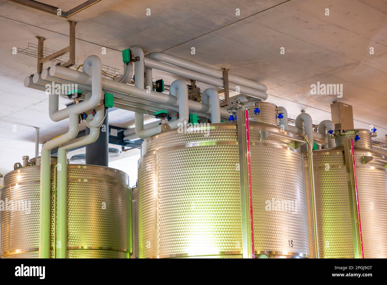 https://c8.alamy.com/comp/2PGJ9GT/modern-winery-stainless-steel-containers-in-switzerland-2PGJ9GT.jpg