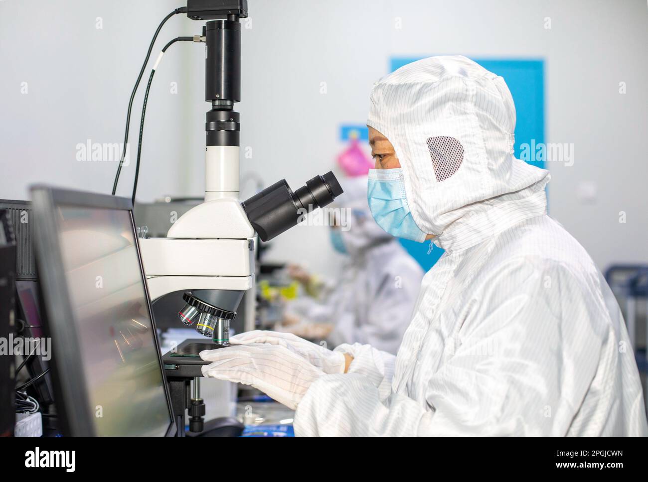 HAI'AN, CHINA - MARCH 23, 2023 - A worker makes and tests semiconductor ...