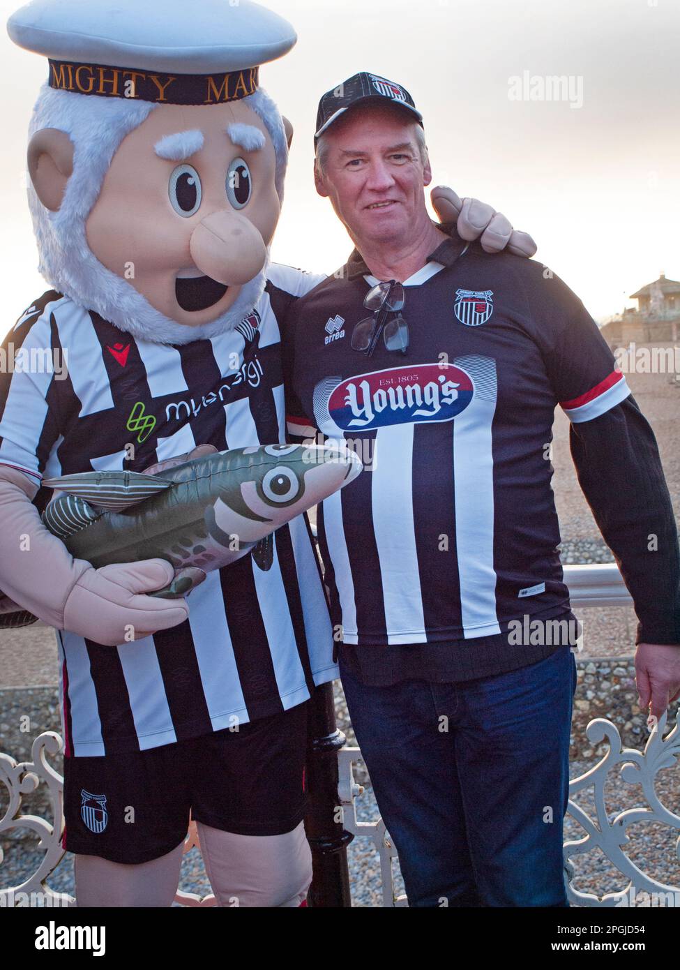 Fans of Grimsby Town Football Club in Brighton to support their team Stock Photo