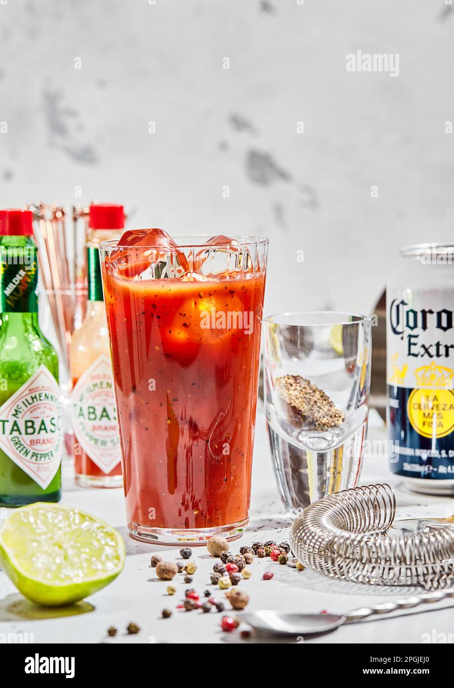 LONDON, UK MARCH 22, 2023 Corona beer with bloody mary cocktail and