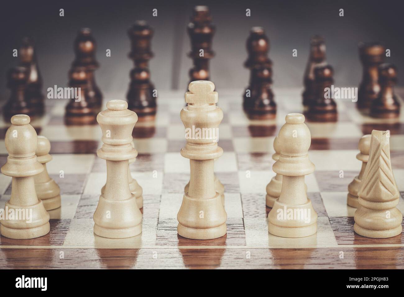 brown chess board with figures on a wooden table in a cafe, playing chess  Stock Photo - Alamy