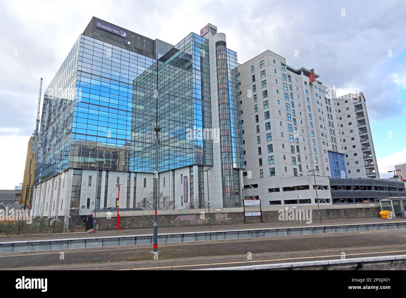 Premier Inn viewed from platform at Caerdydd Heol y Frenhines, Cardiff Queen Street, railway station, Cardiff city centre, Wales, UK Stock Photo