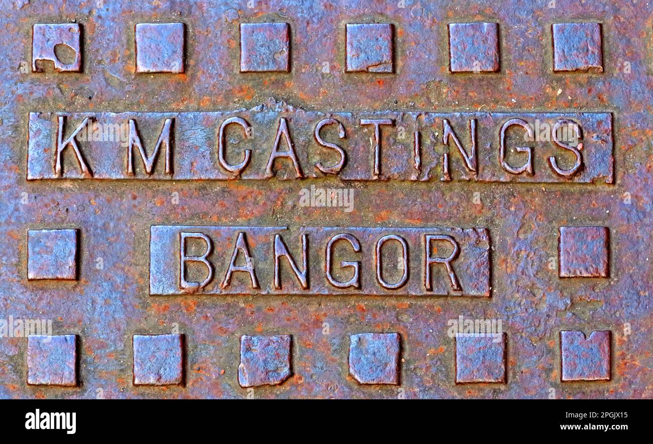 rusting KM Castings Bangor embossed grid, Wales, UK Stock Photo