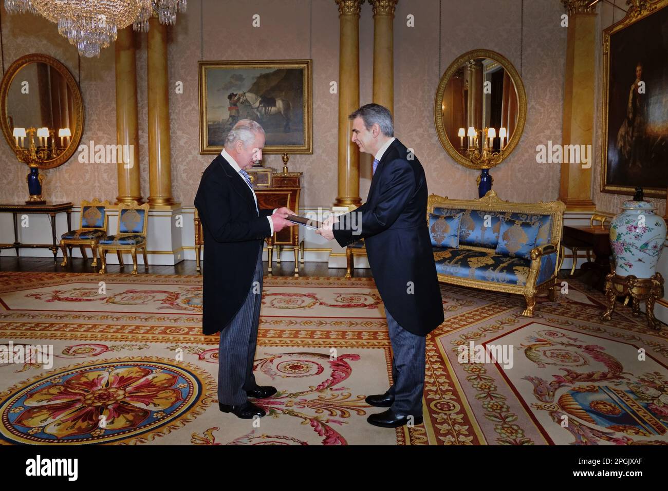 King Charles III receives the Ambassador of Greece, Ioannis Raptakis, as he  presents his credentials during a private audience at Buckingham Palace,  London. Picture date: Thursday March 23, 2023. Photo credit should