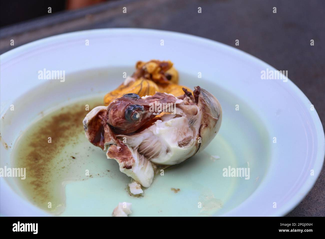Balut egg : boiled duck embryo, fertilized eggs, asian aphrodisiac culinary specialty (street food) popular in Philippines, Cambodia, Vietnam, China Stock Photo