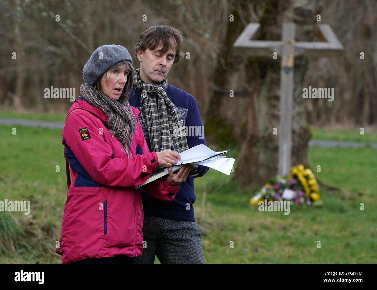 Scotland's Makar Kathleen Jamie alongside Alec Finlay as they read a poem after a minute's silence at Scotland's Covid Memorial in Glasgow to mark third anniversary of Covid-19 pandemic as part of the National Day of Reflection. Picture date: Thursday March 23, 2023. Stock Photo