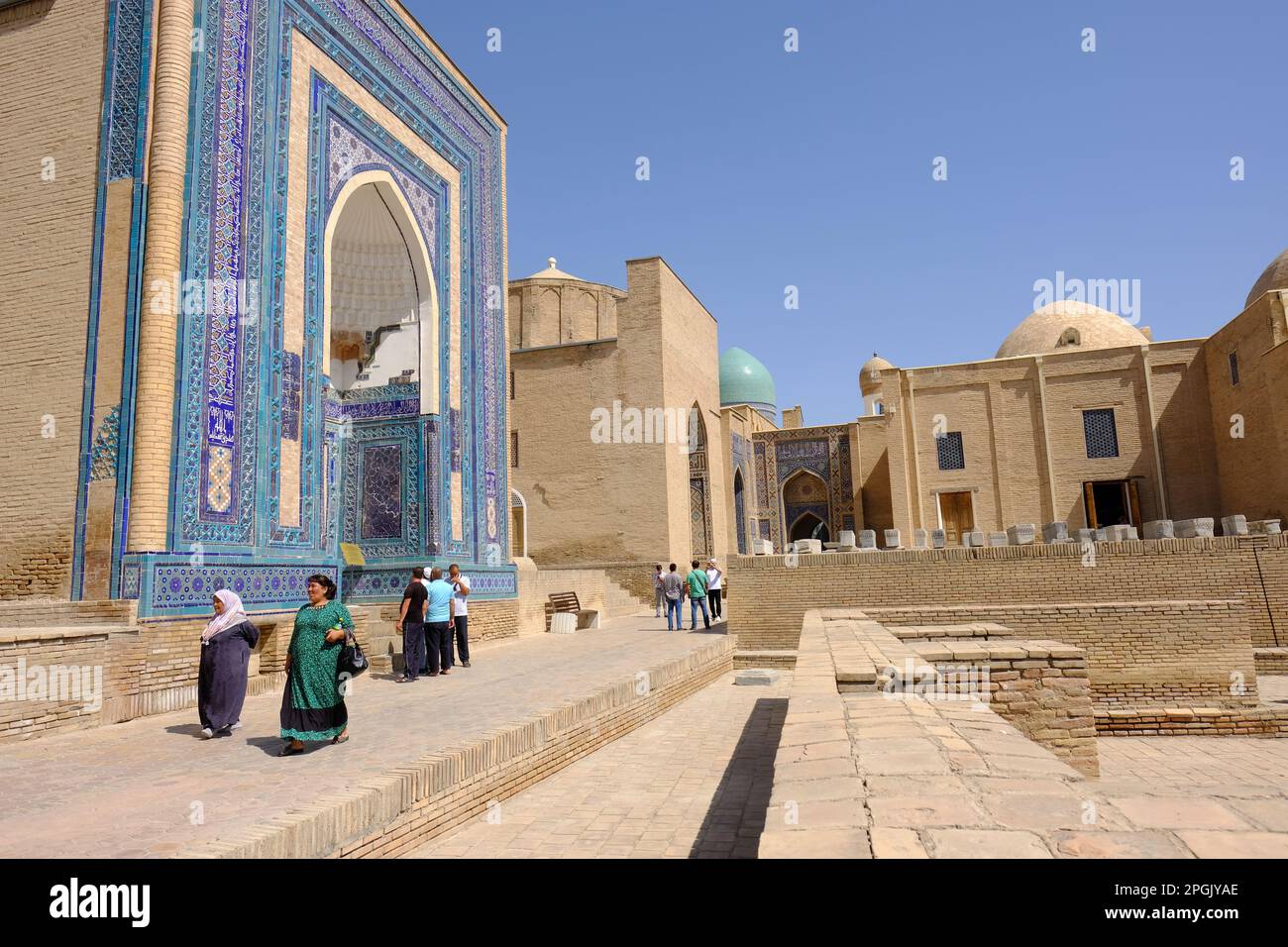 Samarkand Uzbekistan visitors at the Shahi Zinda ( Shah i Zinda ) ancient tomb and mausoleum complex in August 2022 Stock Photo